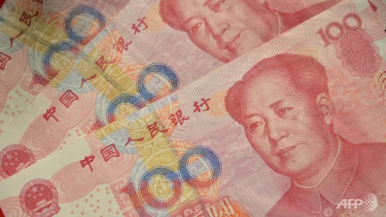 中国人民元(オフショア)Chinese yuan notes. (AFP/Peter Parks)