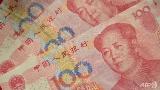 中国人民元(オフショア)Chinese yuan notes. (AFP/Peter Parks)